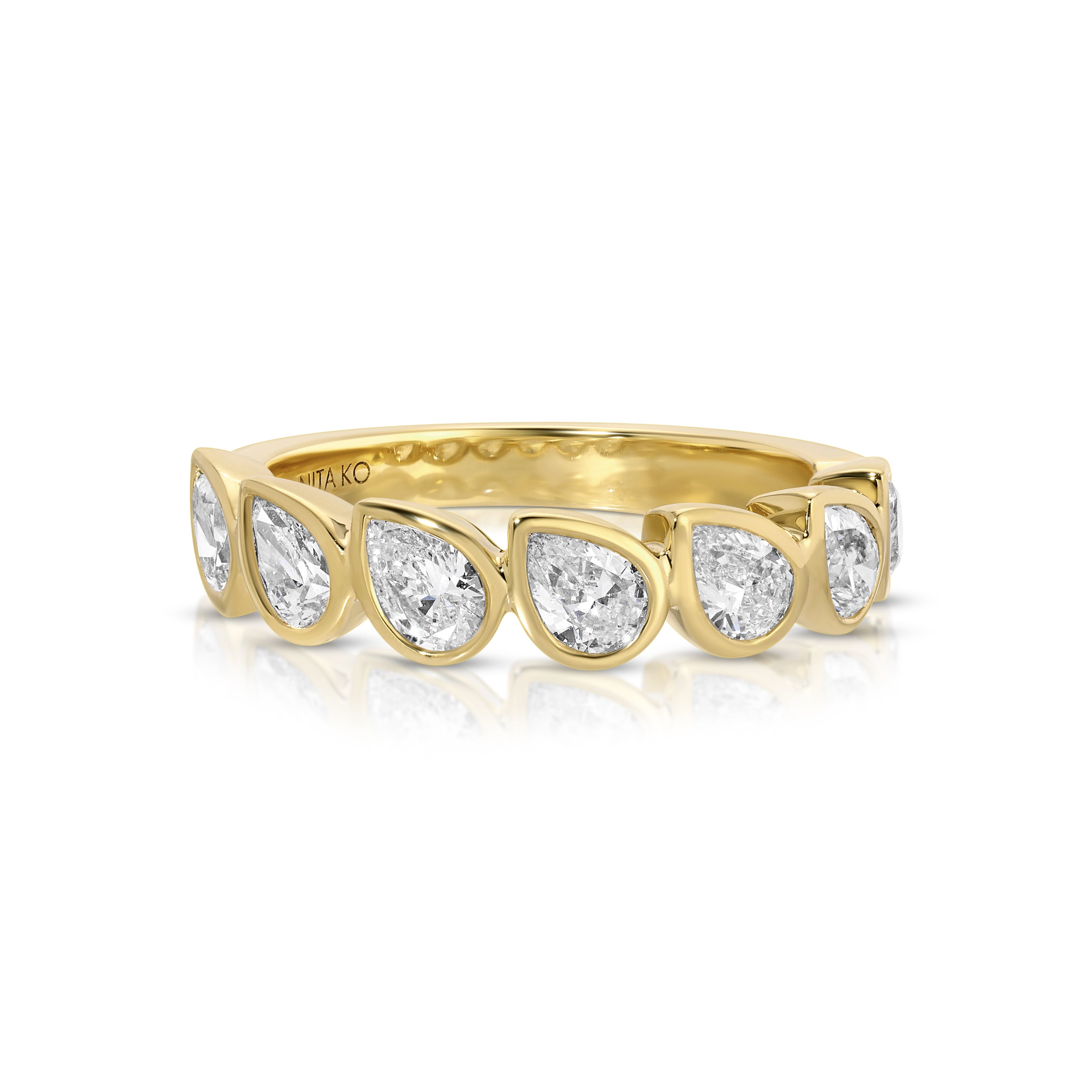 BEZELED PEAR DIAMOND DEMI-ETERNITY BAND